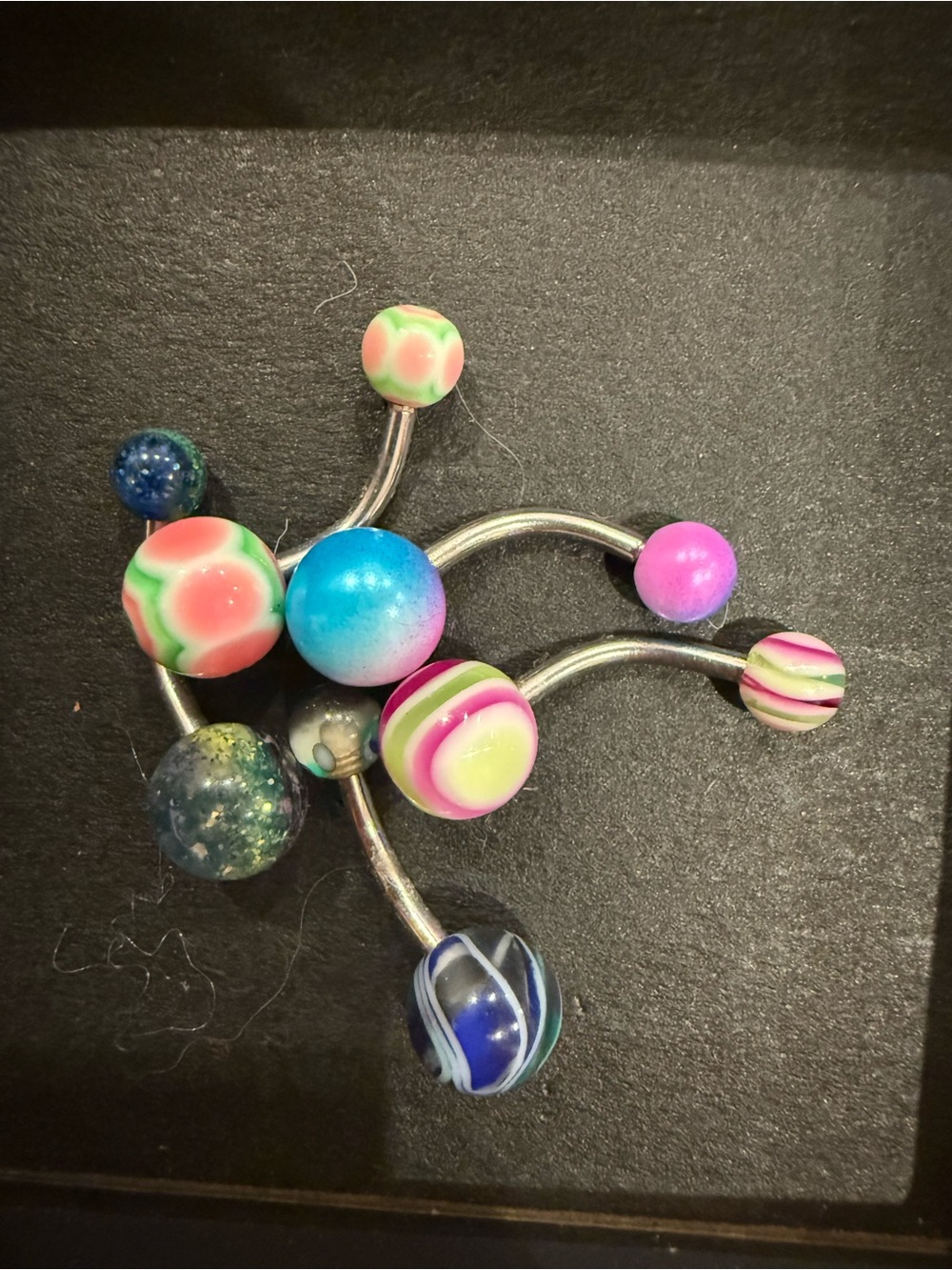 Pack of Naval Rings 16g surgical steel external thread beads.